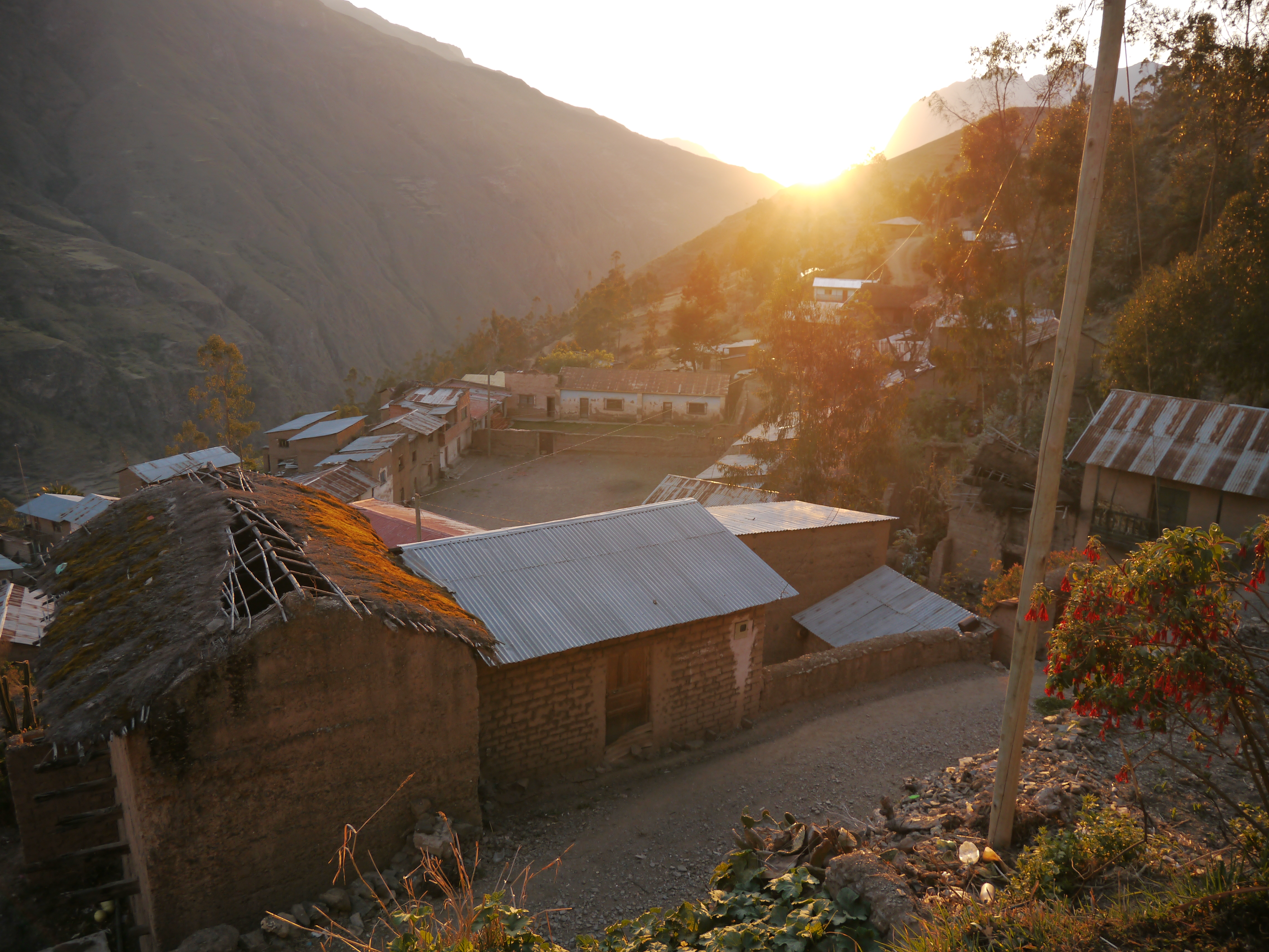 Sunrise over village in mountainous valley in Niñocorin, Bolivia